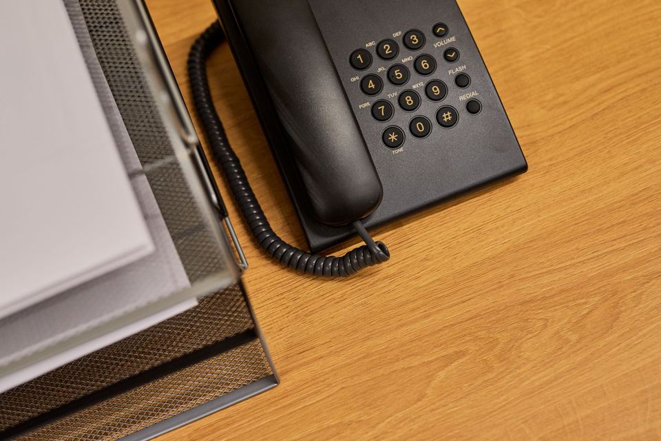 An office telephone on a desk